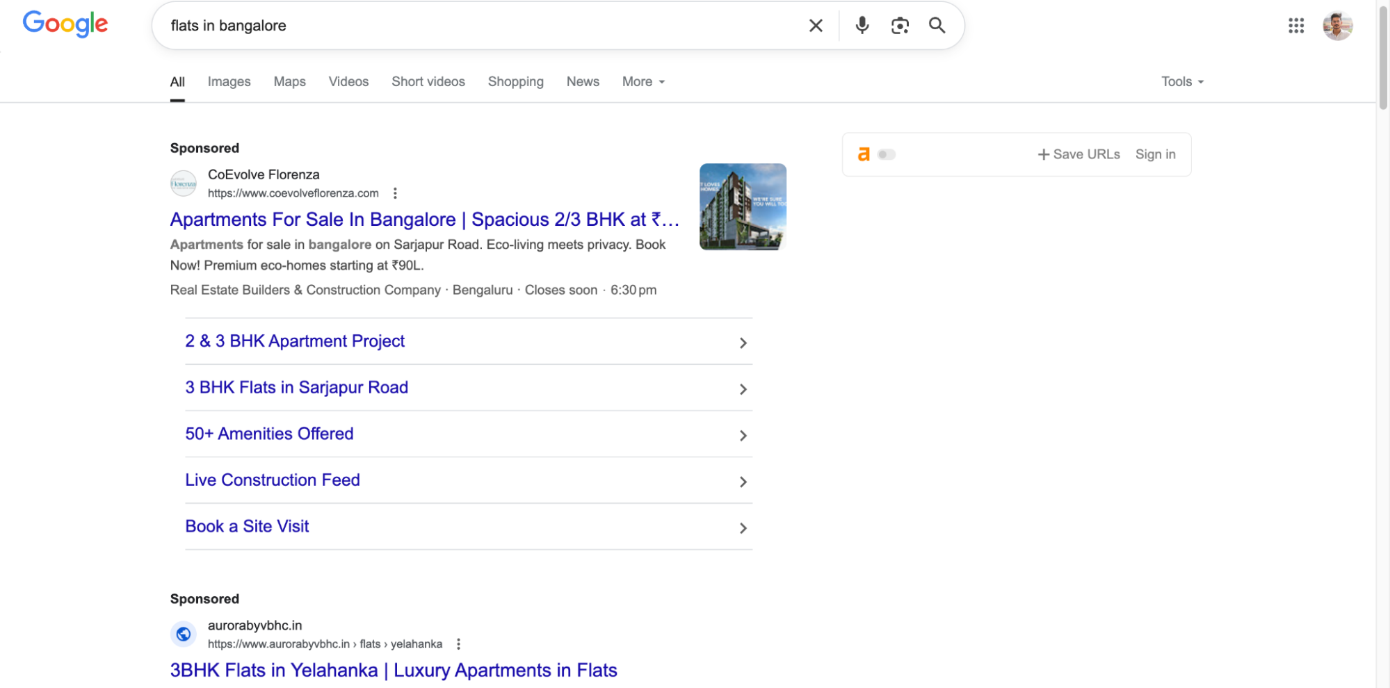 Google search results page for “flats in Bangalore” showing ads.