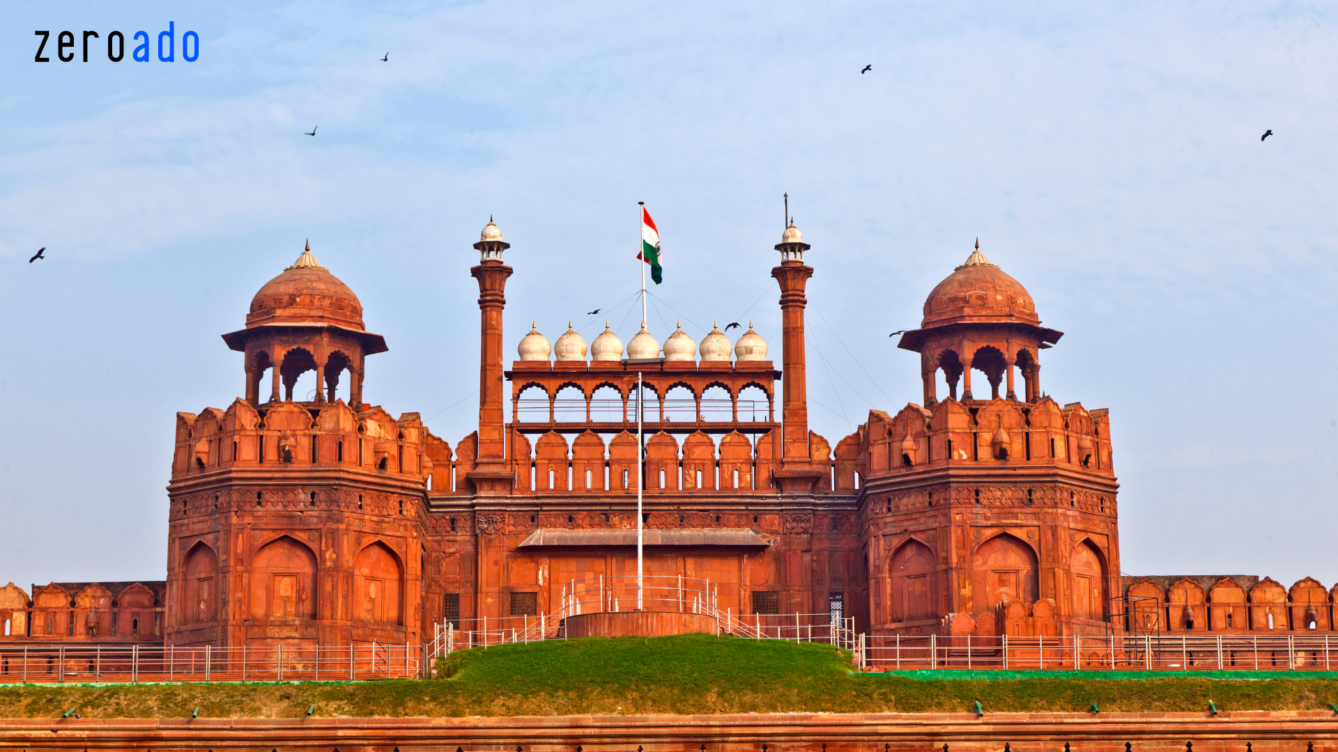 Red Fort in Delhi under a clear blue sky.