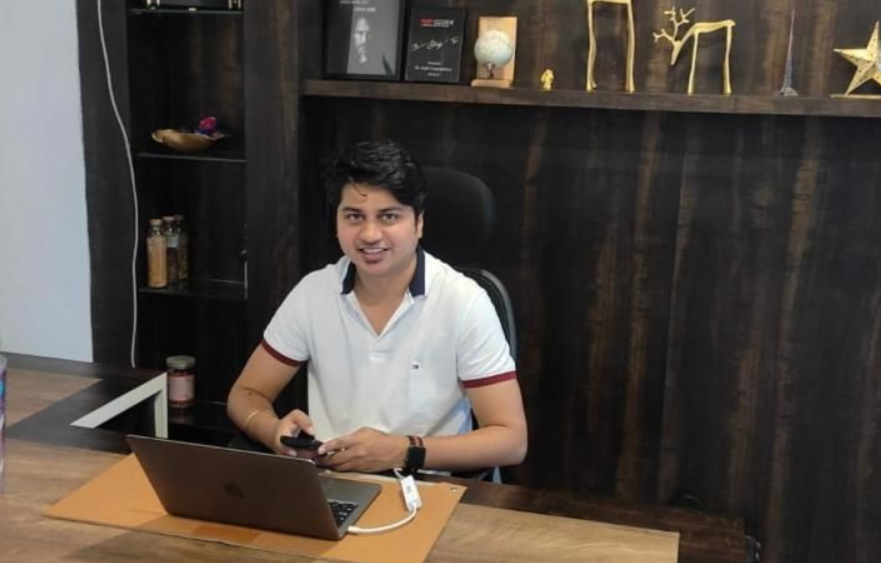 Kunal Gupta, co-founder and CEO of EMotorad, working at his desk. 