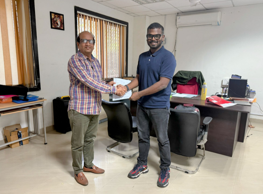 Olee Space founder Suman Hiremath standing on the right during a collaboration with NIT Surat. 